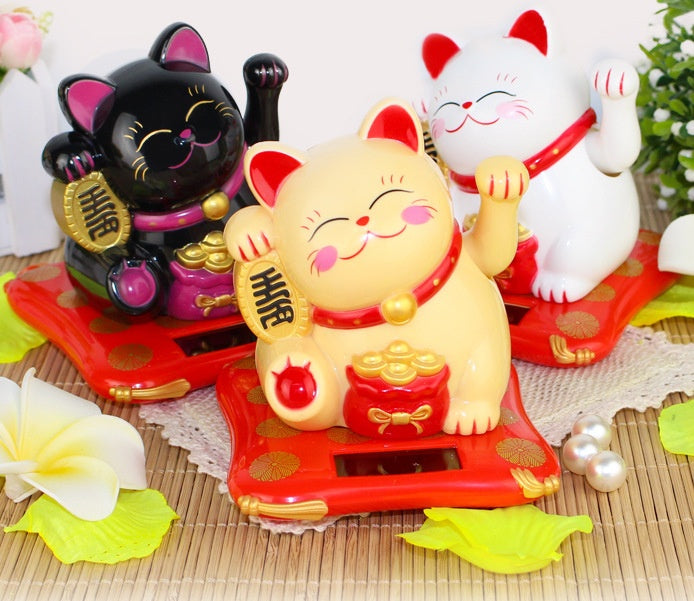 Hand-cranked cats, solar-powered car decorations, ornaments